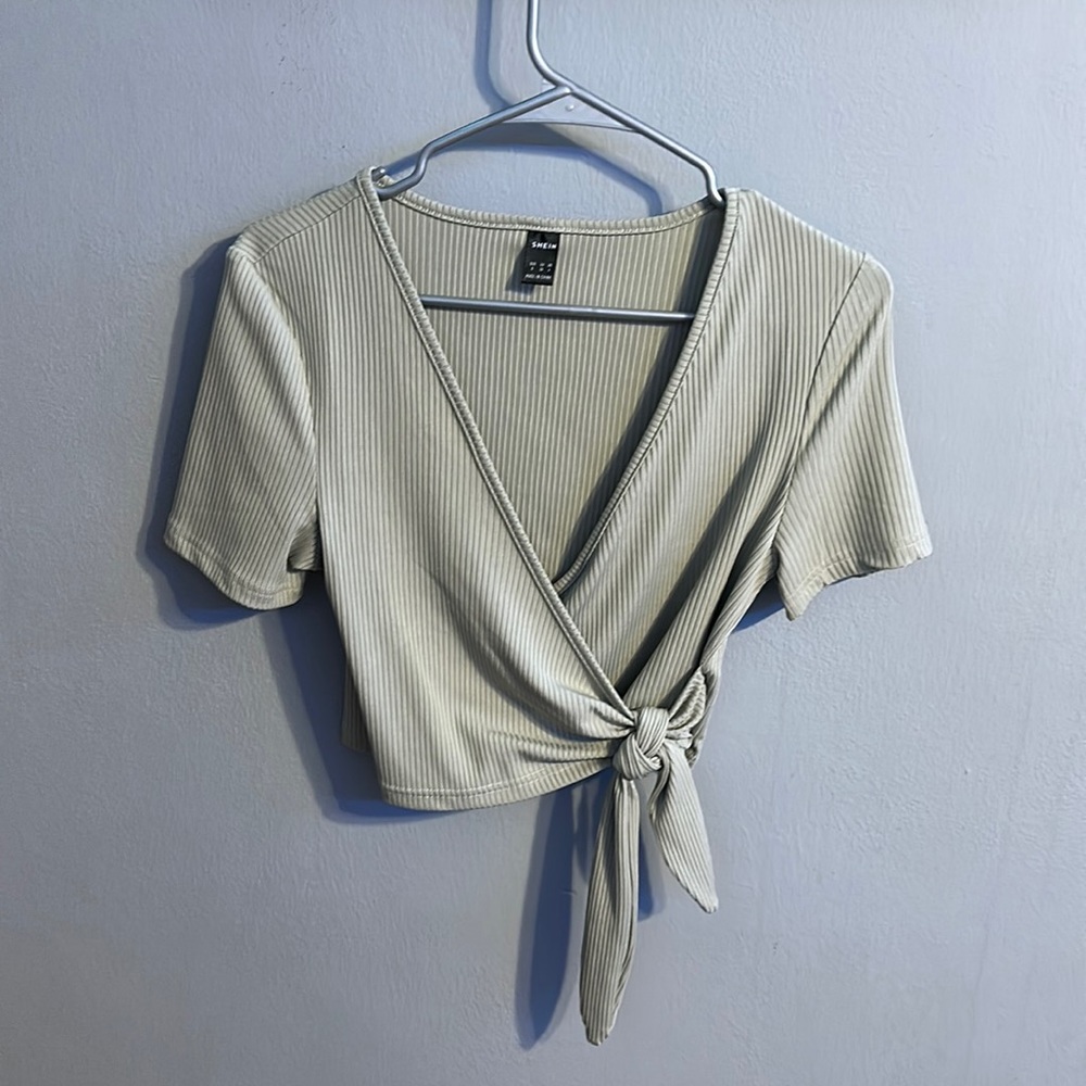 Green v-neck tee shirt